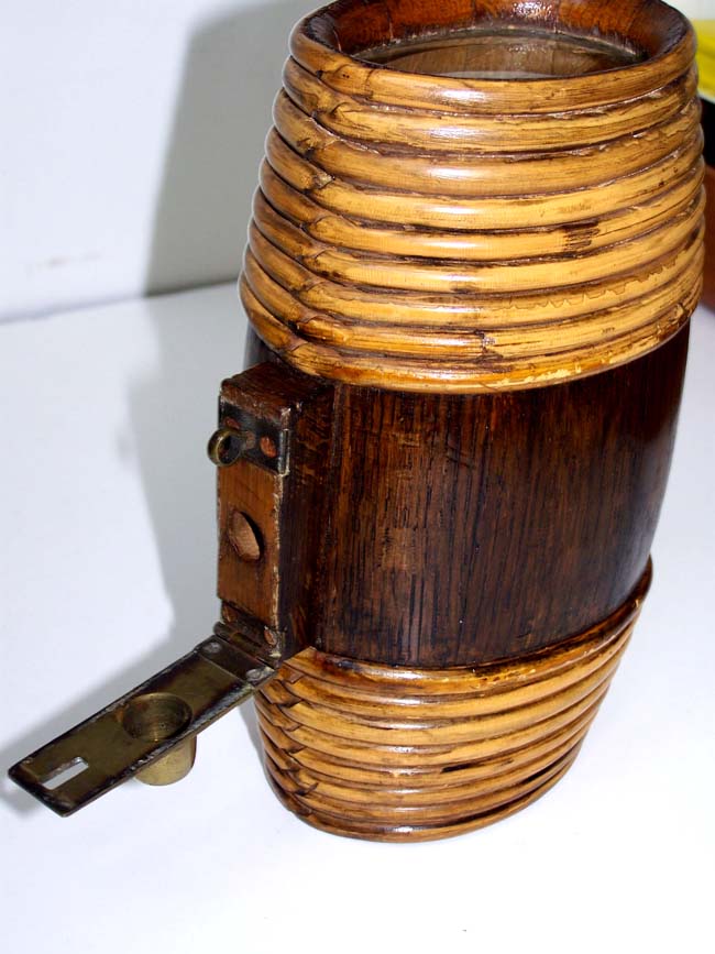 An antique whiskey flask or keg with rattan wrapped ends circa 1890-1900 — image 3